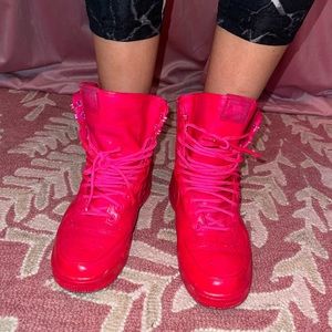Hot pink Nike high top sneakers